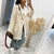 Lapel Collar Exposed Seam Buttoned Coat Cream